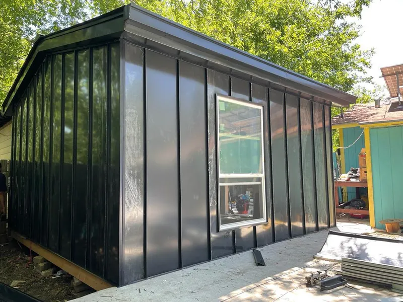 Black standing seam metal wall panels for Roof Inspection in Oradell