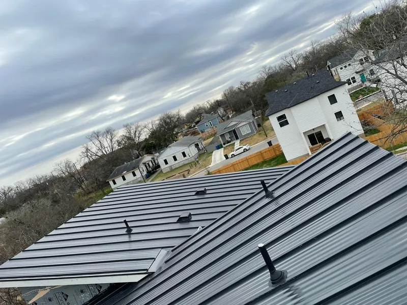 Standing seam metal roof panels with vents for Skylight Repair in Oradell